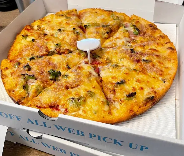 Cavatappi pasta baked with homemade meat sauce and Alberta mozzarella at Estoria Pizzeria