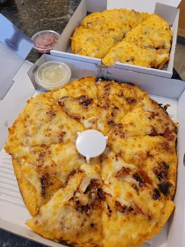 Fresh Greek salad with quality ingredients at Estoria Pizzeria Calgary