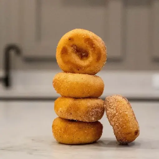 Wings by the pound with choice of sauce at Estoria Pizzeria Calgary SE