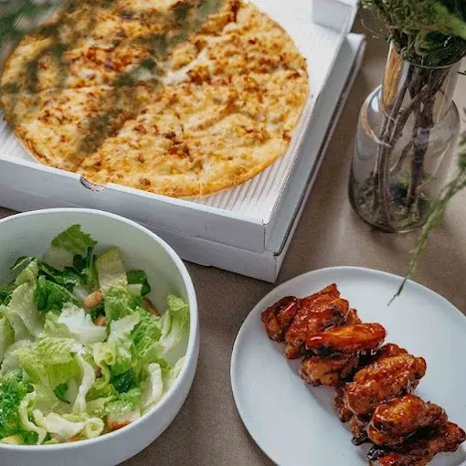 Authentic Greek baklava dessert prepared traditional style at Estoria Pizzeria